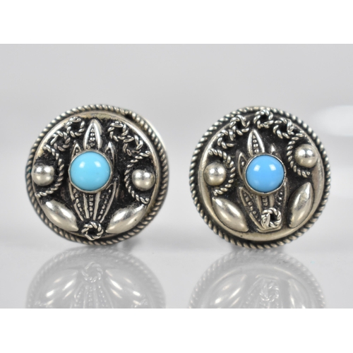 229 - A Pair of White Metal Navajo Style Clip on Earrings, Circular Form with Round Cabochon Turquoise Sto... 