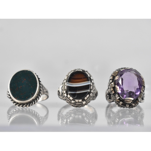 256 - A Collection of Three Silver and White Metal Rings to include Unusual Continental Banded Agate Examp... 