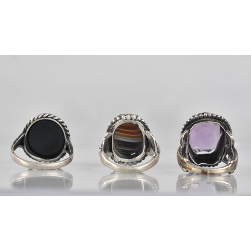 256 - A Collection of Three Silver and White Metal Rings to include Unusual Continental Banded Agate Examp... 