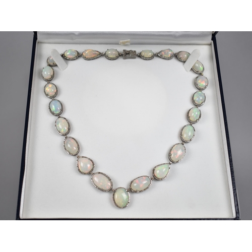 44 - An Opal and Diamond Necklace, 23 Mixed Shape Matched Opals Comprising Pear and Oval Cabochon, 93.52c... 