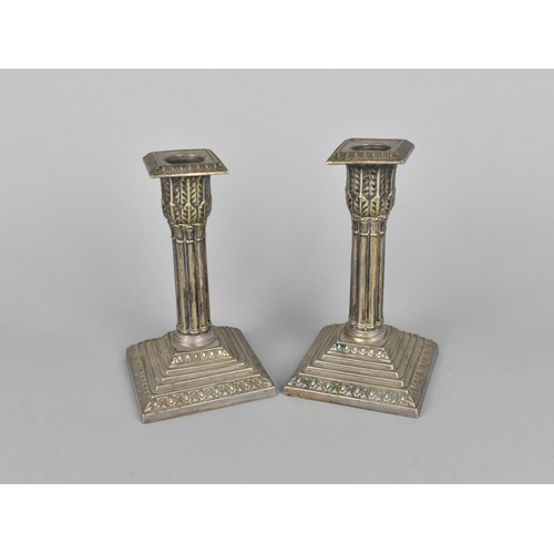 142 - A Pair of Edwardian Silver Plated Corinthian Column Candlesticks on Stepped Square Bases, 15cms High