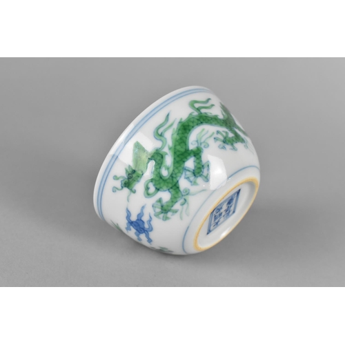 275 - Two Chinese Porcelain Tea Bowls, the Smaller Example Decorated with Flowers and the Larger with Drag... 