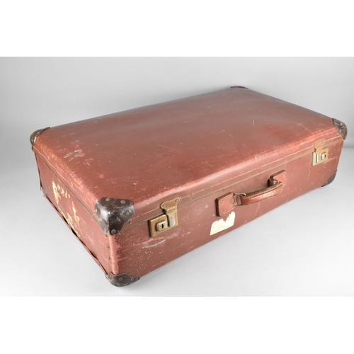 387 - A Vintage Travelling Trunk with Vintage Cabin Luggage Stickers etc, 73cm wide