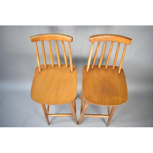 587 - Two Mid 20th Century Spindle Back Bar Stools