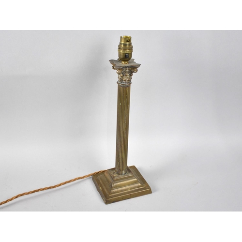 76 - An Edwardian Brass Table Lamp Base in the form of a Reeded Corinthian Coolum, 37cms High