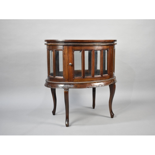 87 - A Reproduction Mahogany Oval Tray Top Bijouterie Cabinet of Oval Form on Cabriole Supports, 68cms Wi... 