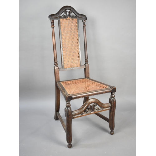 97 - A 19th Century Cane Seated and Backed Oak Framed Side Chair with Pierced and Arched Top Rail