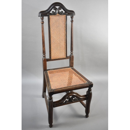 97 - A 19th Century Cane Seated and Backed Oak Framed Side Chair with Pierced and Arched Top Rail