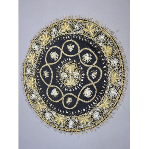 98 - An Indian Gilt Wire Embroidered Centre Table Cloth, 56cms Diameter