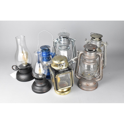 441 - A Collection of Various Oil and Battery Lamps