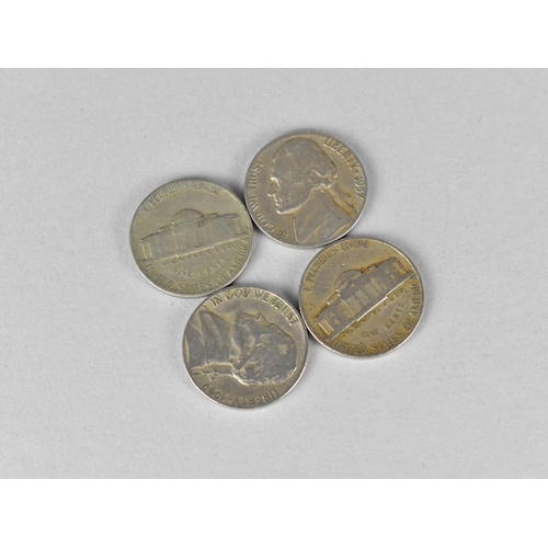 454 - A 1941 American Five Cents, together with a 1957, 1958 and 1959 Example