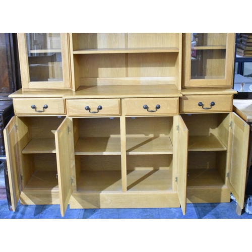 459 - A Modern Light Oak Breakfront Dresser, the Base with Four Drawers Over Cupboards, Raised Central Thr... 