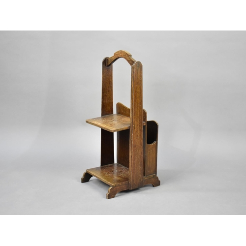 62 - An Edwardian Oak Portable Book and Magazine Stand, 60cms High