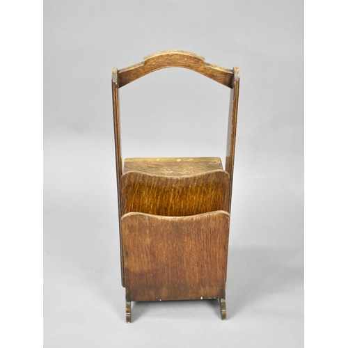 62 - An Edwardian Oak Portable Book and Magazine Stand, 60cms High