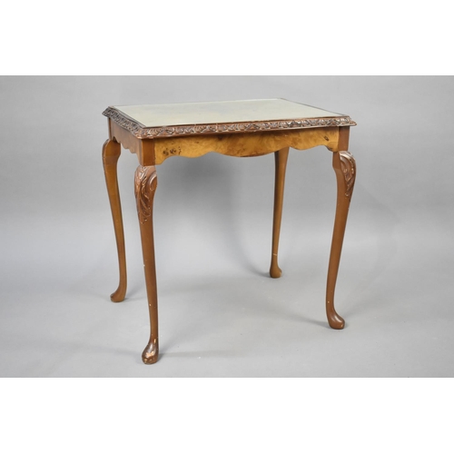 81 - A Walnut Rectangular Occasional Table with Glass Top, 54cms Wide