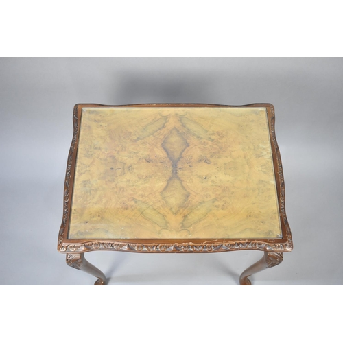 81 - A Walnut Rectangular Occasional Table with Glass Top, 54cms Wide