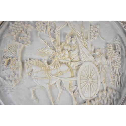 130 - A Chinese Style Faux Ivory Circular Topped Table Decorated in Relief to Top with Cart Horse and Figu... 