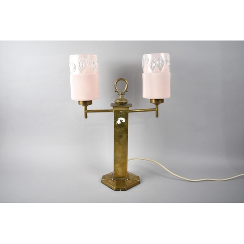 134 - A Brass Two Branch Table Lamp with Pink Glass Cylindrical Shade, 47cms High