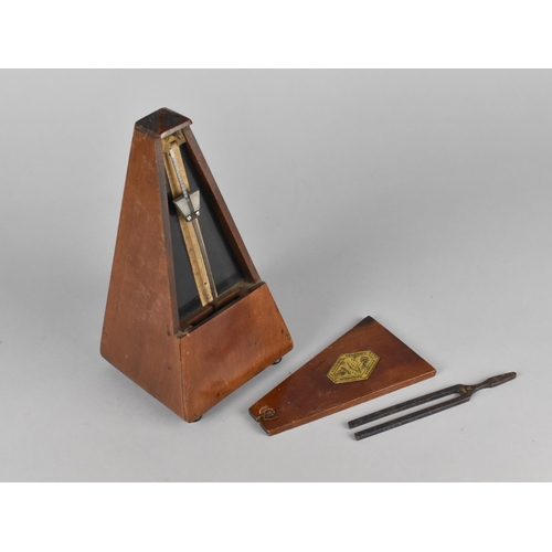 141 - A French Mahogany Metronome, 22cms High together with a Tuning Fork