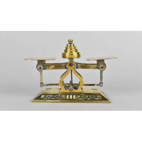 18 - An Edwardian Brass Postage Scale on Rectangular Brass Plinth, Complete with Weights, 16cms High