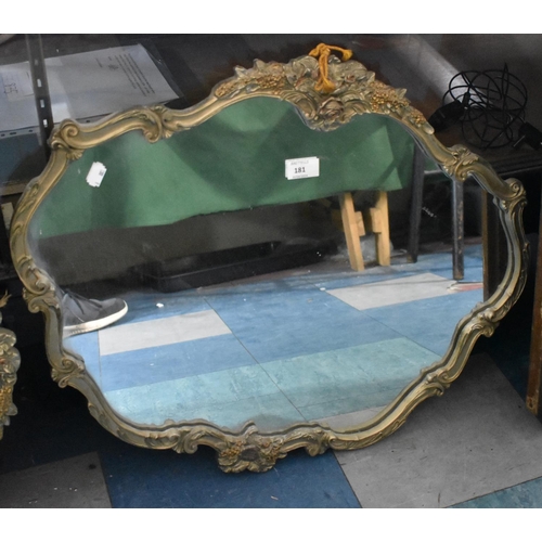 181 - An Ornate Framed Mirror with Moulded Scrolls and Foliage Decoration