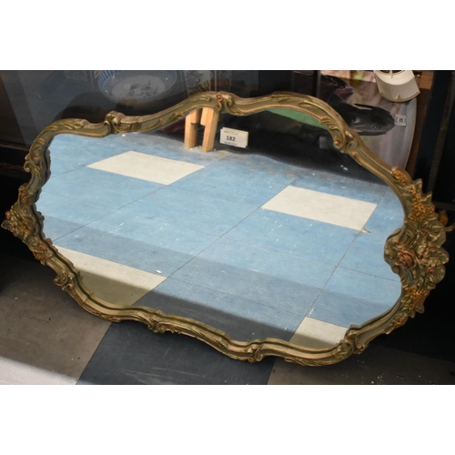 182 - An Ornate Framed Wall Mirror with Scrolled and Floral Decoration