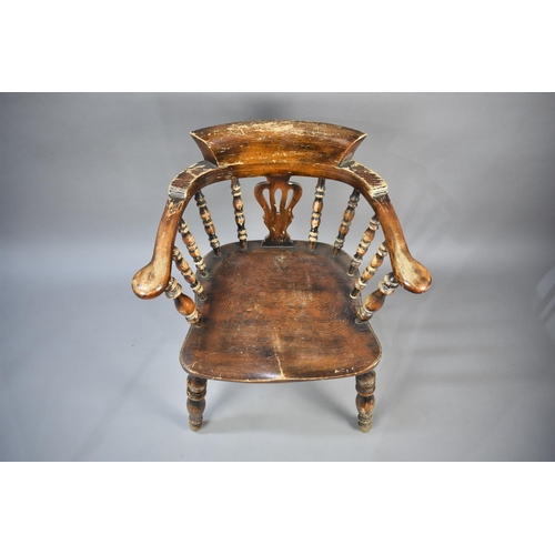 501 - An Early 20th Century Smokers Bow Tub Armchair with Spindle and Vase Pierced Back on Turned Supports