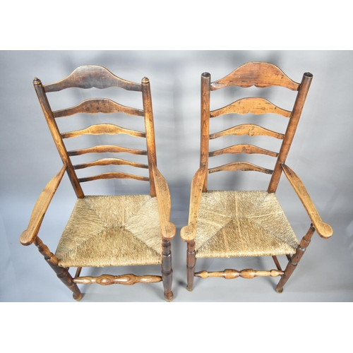 505 - A Pair of Rush Seated Ladder Back Armchairs