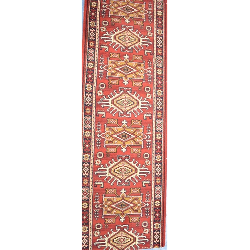 508 - A Patterned Runner or Stair Carpet on Red Ground, 387x52cms Approx, Cut