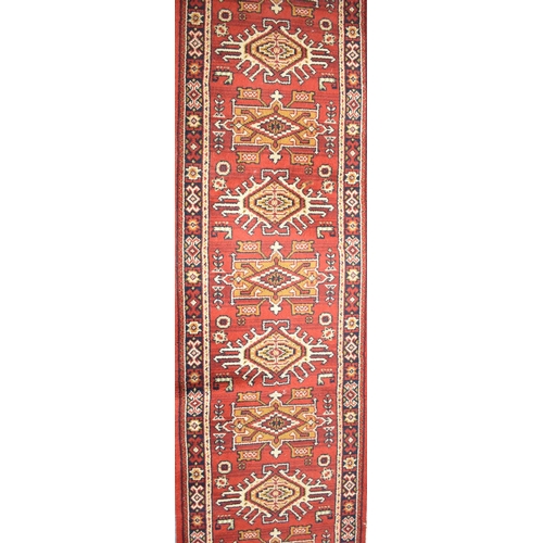 508 - A Patterned Runner or Stair Carpet on Red Ground, 387x52cms Approx, Cut