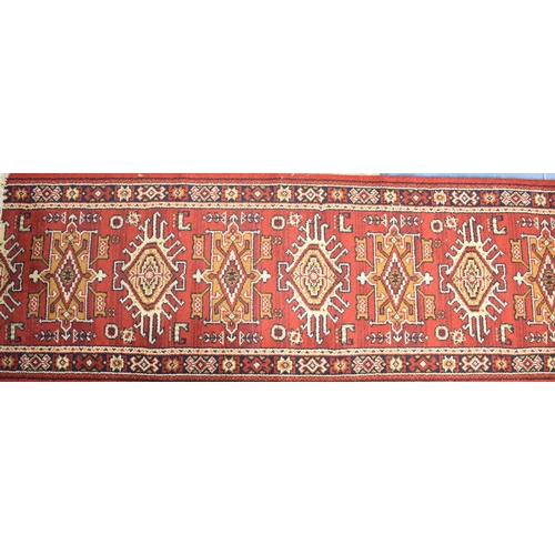 508 - A Patterned Runner or Stair Carpet on Red Ground, 387x52cms Approx, Cut