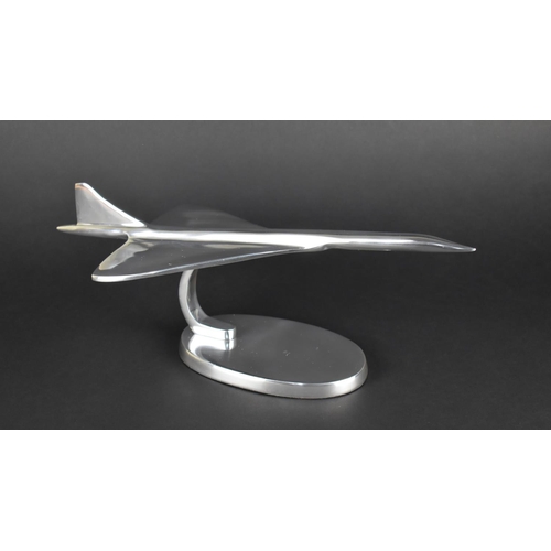 65 - A Polished Aluminium Model of Concorde, 15cms High (plus VAT)