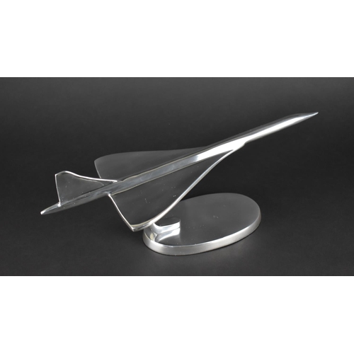 65 - A Polished Aluminium Model of Concorde, 15cms High (plus VAT)