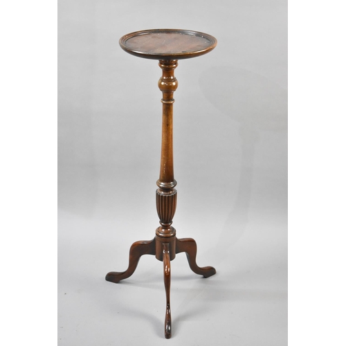 67 - A Mahogany Torchere Stand with Circular Top having Turned Supports Culminating to Reeded Vase Base S... 