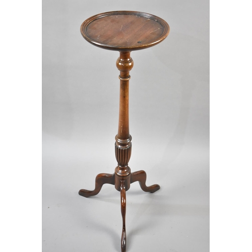 67 - A Mahogany Torchere Stand with Circular Top having Turned Supports Culminating to Reeded Vase Base S... 