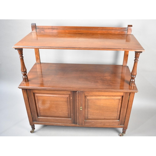 84 - A 19th Century Mahogany Buffet with Cupboard Base Raised on Short Turned Feet Culminating In Castors... 