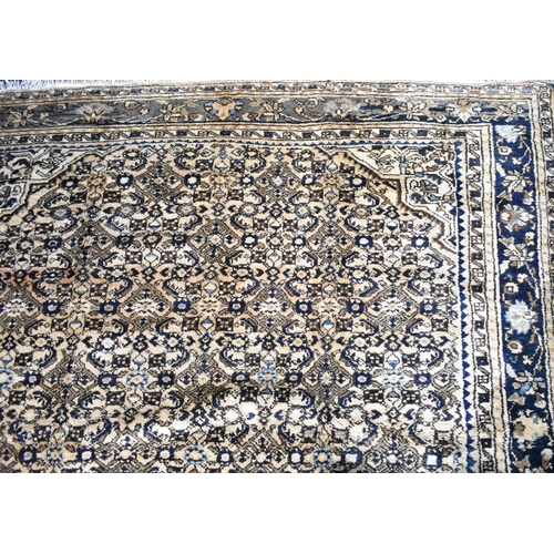 494 - A Persian Handmade Mehraban Carpet, 323x201cms