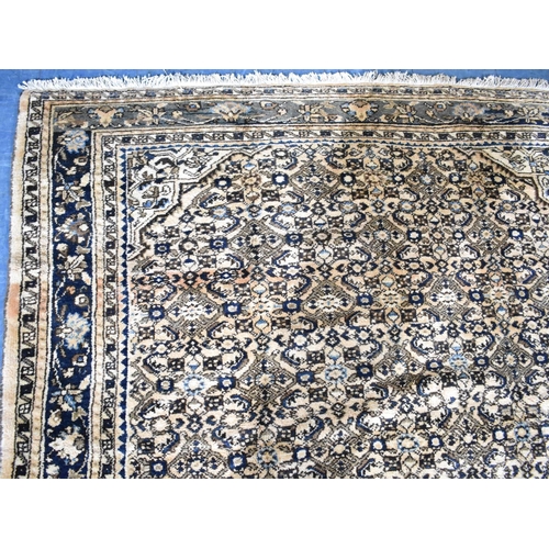 494 - A Persian Handmade Mehraban Carpet, 323x201cms