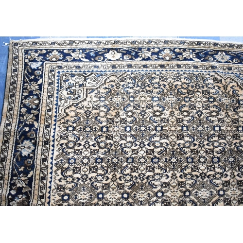 494 - A Persian Handmade Mehraban Carpet, 323x201cms