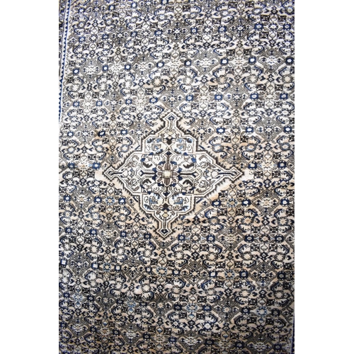 494 - A Persian Handmade Mehraban Carpet, 323x201cms