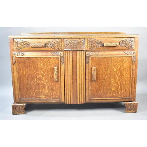 511 - A Mid 20th Century Oak Sideboard with Base Cupboards Surmounted by Two Short Drawers, 134x45x87cms