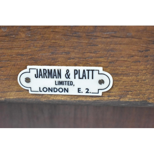 511 - A Mid 20th Century Oak Sideboard with Base Cupboards Surmounted by Two Short Drawers, 134x45x87cms