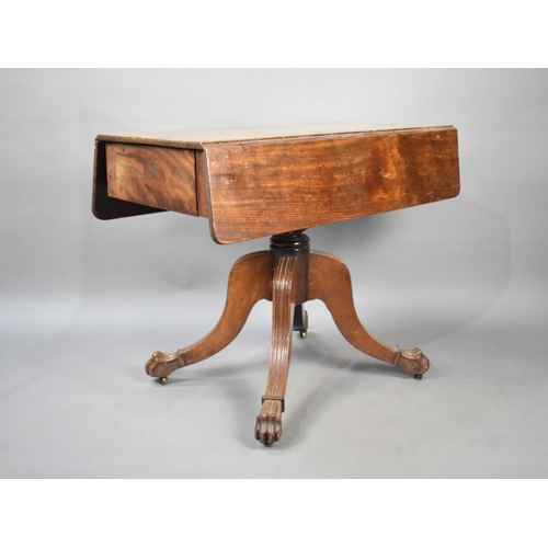 512 - A 19th Century Mahogany Drop Leaf Table on Splayed Quadrant Reeded Supports Culminating in Paw Feet,... 