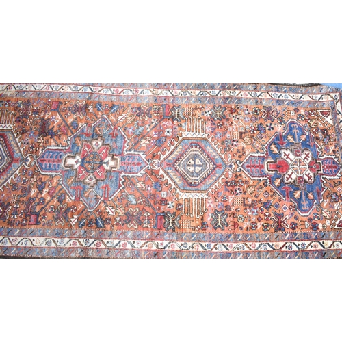 530 - A Persian Handmade Heriz Runner, 328x110cms