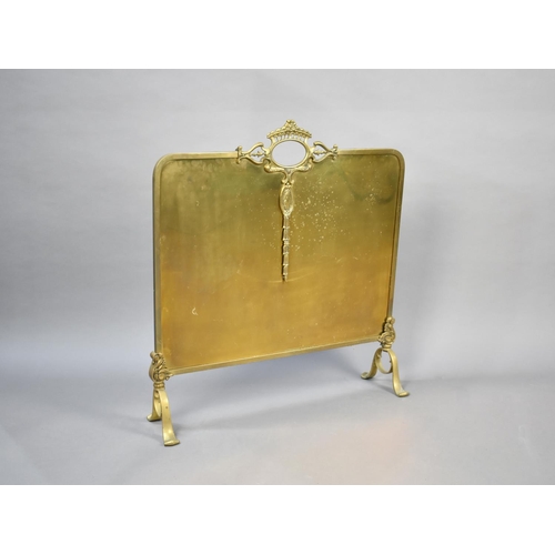 100 - A Mid 20th Century Brass Fire Screen, 61cms Wide