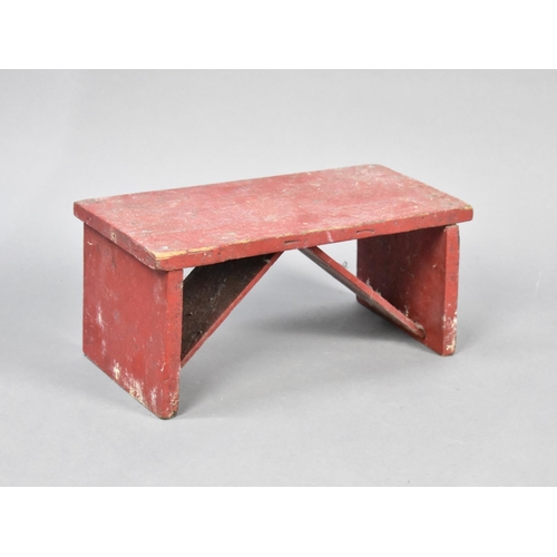 159 - A Vintage Red Painted Rectangular Stool, 37cms Wide and 17cms High