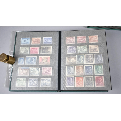 167 - A Collection of Various Stamp Albums, Stock Books, Commemorative Sets Etc