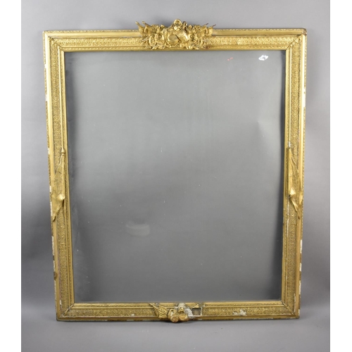 184 - A Large Glazed Gilt Picture Frame with Military Mounts, Union Jacks Etc, 95x113cms Condition Issues