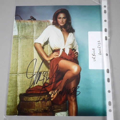 192 - A Framed and Autographed Coloured Photo of Ursula Andress with Certificate of Authenticity