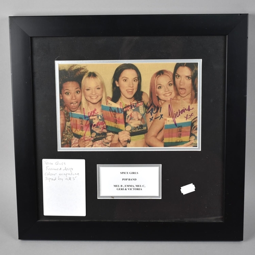 202 - A Framed Colour Photograph of The Spice Girls Signed by All Five Members